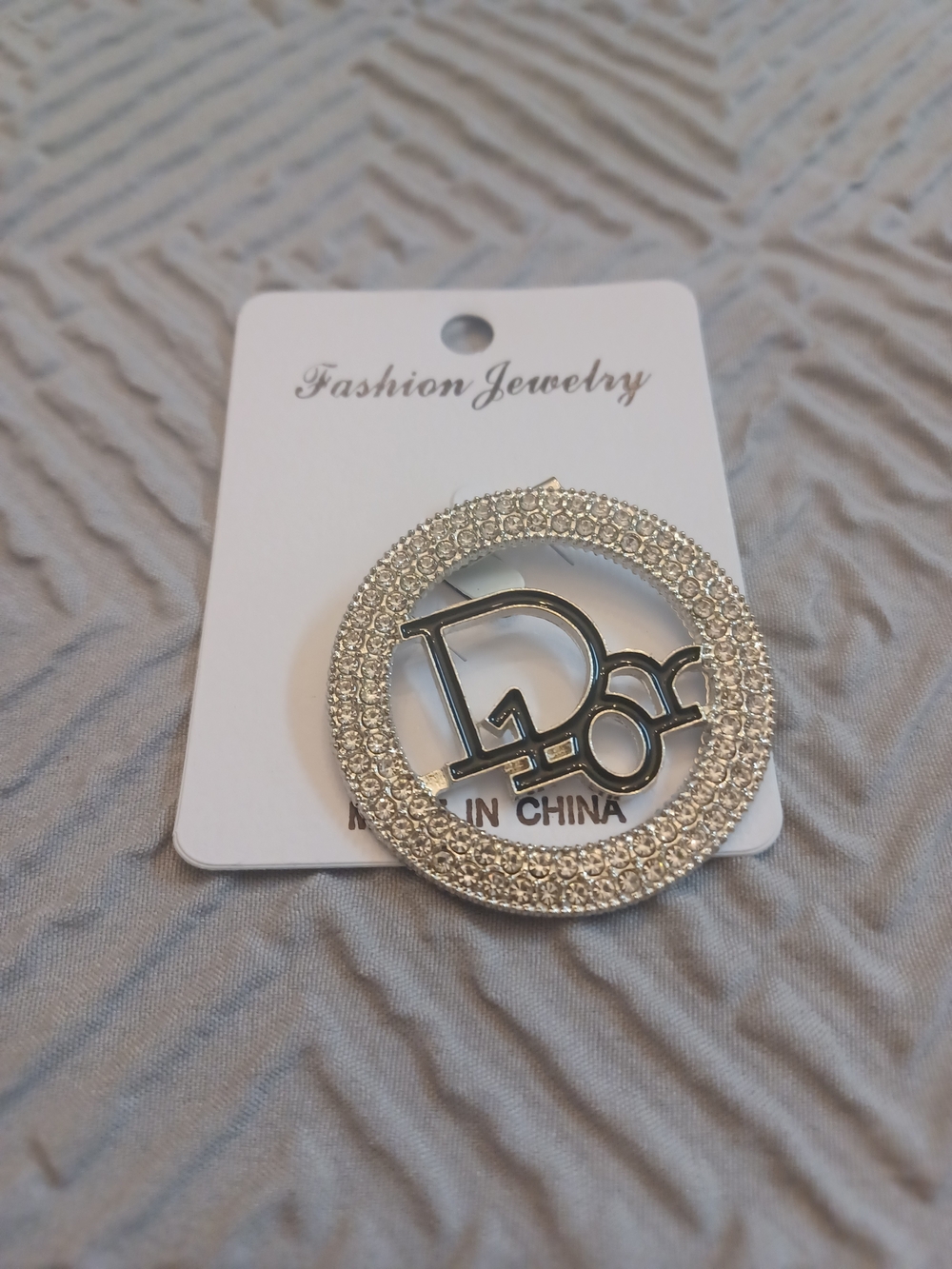 Silver Crystal Logo Circle Brooch - Fashion Jewelry